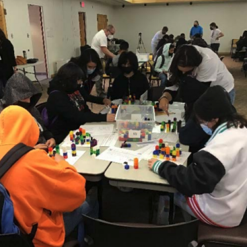 group of kids play Skyscrapers